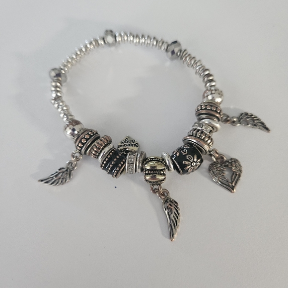 Bracelets with silver and gold tones. - Picture 3 of 4